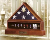 The Presidential Pedestal Urn Flag & Medal Display Case is a beautiful urn in a Walnut or Cherry finish and is crafted in the USA.
